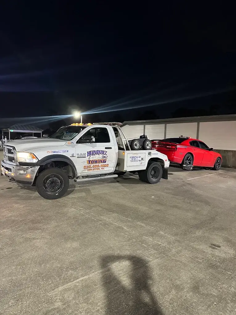Emergency towing truck responding to vehicle breakdown in East Houston